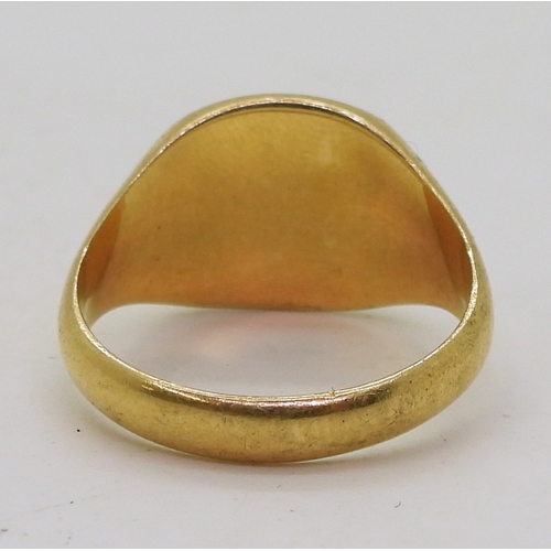 9062 - An 18ct gold signet ring with Birmingham hallmarks for 1966, size R, weight 8.1gms