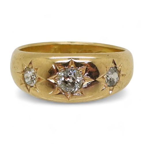 9063 - An 18ct rose gold three stone diamond ring, set with three star set old cut diamonds, hallmarked Che... 