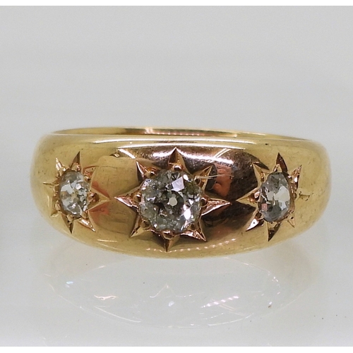 9063 - An 18ct rose gold three stone diamond ring, set with three star set old cut diamonds, hallmarked Che... 