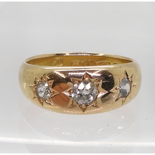 9063 - An 18ct rose gold three stone diamond ring, set with three star set old cut diamonds, hallmarked Che... 