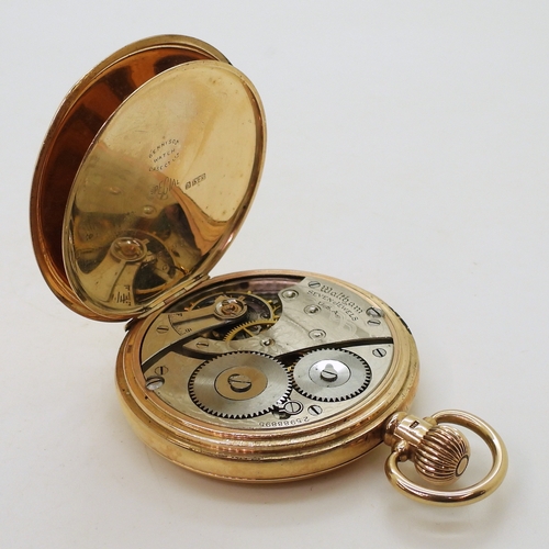 A 9ct gold Waltham full hunter pocket watch with classic white enamel dial subsidiary seconds dial
