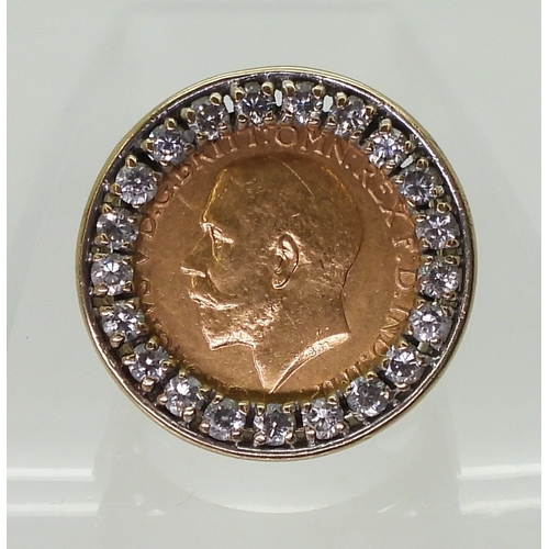 9123 - A 1912 gold full sovereign in a 9ct gold ring mount with a circle of cubic zirconas around the coin,... 