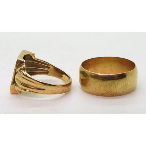 9130 - A 9ct gold wide wedding ring, size Z, weight 8.5gms, together with a 10k gold signet ring set with a... 