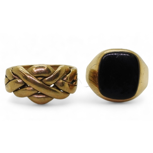 9131 - A 9ct gold puzzle ring, (soldered shut) size V, and a 9ct onyx signet ring, size R, weight together ... 