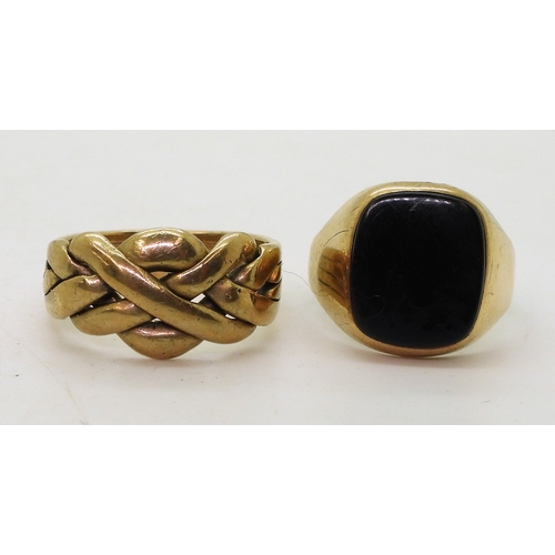 9131 - A 9ct gold puzzle ring, (soldered shut) size V, and a 9ct onyx signet ring, size R, weight together ... 