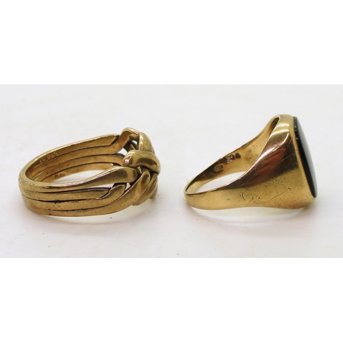 9131 - A 9ct gold puzzle ring, (soldered shut) size V, and a 9ct onyx signet ring, size R, weight together ... 