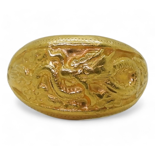 9135 - A Chinese dragon ring, stamped with Chinese characters and 96.5%, size V1/2, weight 7.5gms