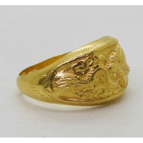 9135 - A Chinese dragon ring, stamped with Chinese characters and 96.5%, size V1/2, weight 7.5gms