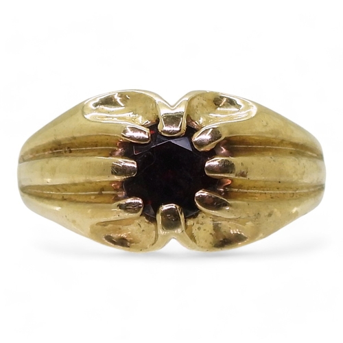 9137 - A 9ct gold garnet set Gypsy ring, size V, weight 10.2gms