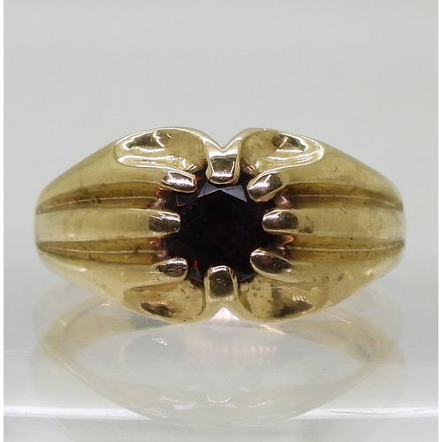 9137 - A 9ct gold garnet set Gypsy ring, size V, weight 10.2gms