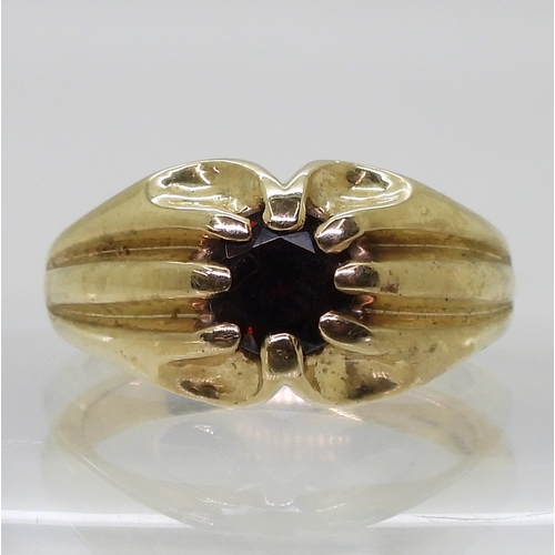 9137 - A 9ct gold garnet set Gypsy ring, size V, weight 10.2gms