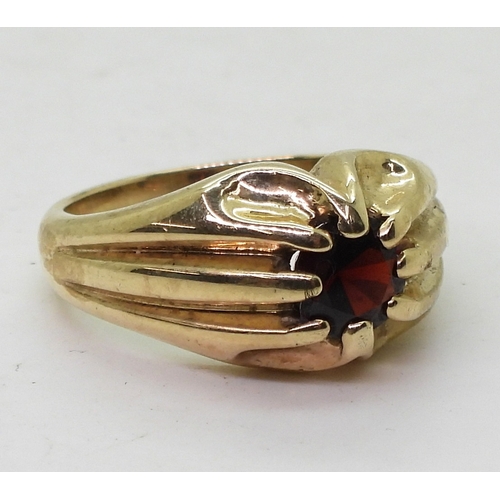 9137 - A 9ct gold garnet set Gypsy ring, size V, weight 10.2gms