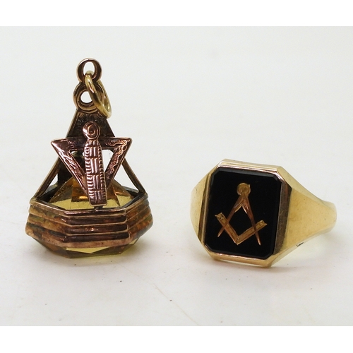 9140 - A 9ct gold carved onyx Masonic ring, size T1/2, together with a vintage Masonic citrine fob seal mad... 