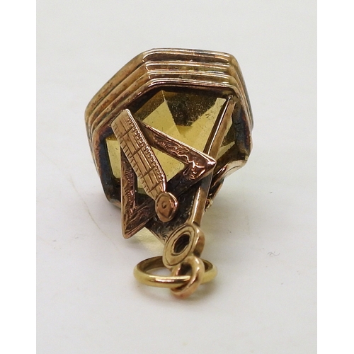 9140 - A 9ct gold carved onyx Masonic ring, size T1/2, together with a vintage Masonic citrine fob seal mad... 