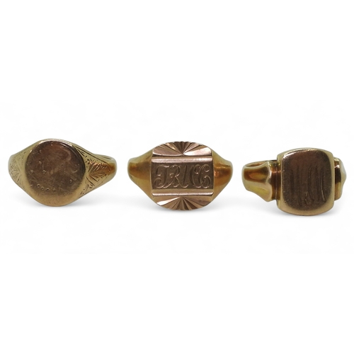 9141 - Three 9ct gold signet rings, monogrammed sunburst, size U1/2, square, size R1/2, oval, size U, weigh... 