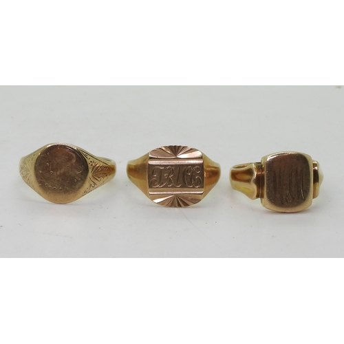 9141 - Three 9ct gold signet rings, monogrammed sunburst, size U1/2, square, size R1/2, oval, size U, weigh... 