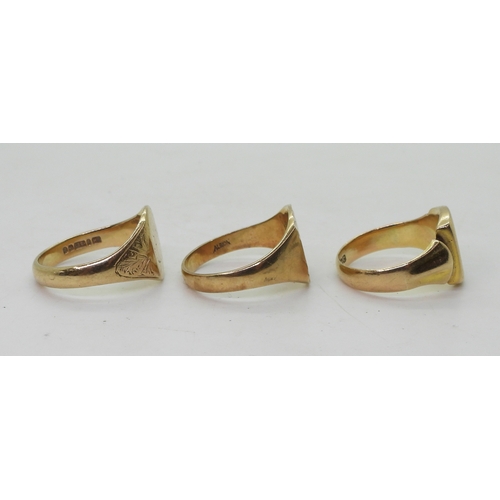 9141 - Three 9ct gold signet rings, monogrammed sunburst, size U1/2, square, size R1/2, oval, size U, weigh... 