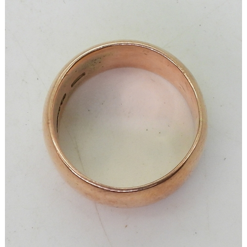 9142 - A 9ct rose gold wide wedding band Birmingham hallmarks for 1908, size R, weight 10.8gms