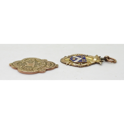 9143 - A 9ct gold the National Master Farriers & Blacksmiths Association medallion, (bail missing) toge... 