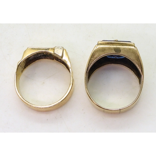 9149 - Two yellow metal rings, a signet ring set with three diamond accents, size V, together with a blue g... 