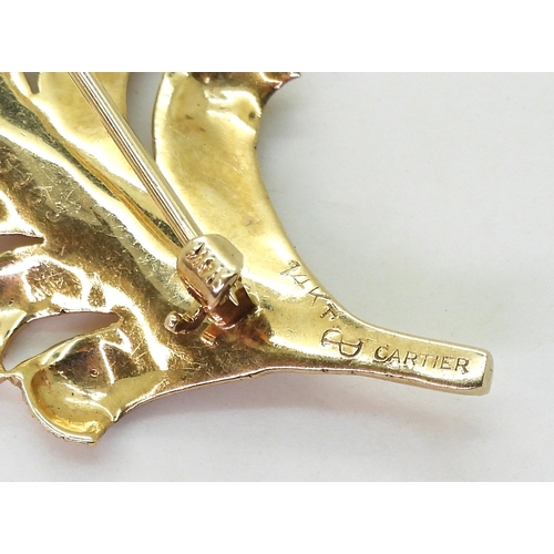 2758 - A CARTIER FEATHER BROOCHmade in 14k gold, signed Cartier to the back. Length 5cm. Weight 8.2gms. In ... 