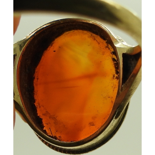 2762 - A CARNELIAN INTAGLIO RINGcarved with a gentleman, in a 9ct gold ring mount, finger size P1/2, weight... 