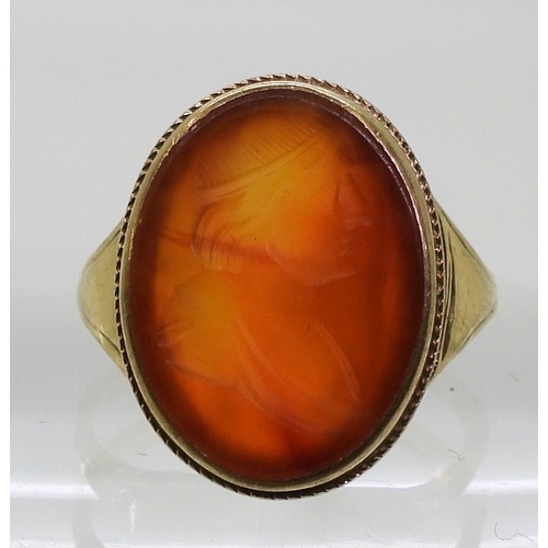 2762 - A CARNELIAN INTAGLIO RINGcarved with a gentleman, in a 9ct gold ring mount, finger size P1/2, weight... 