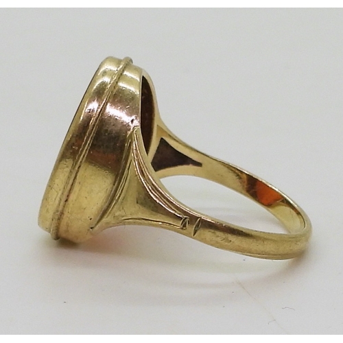 2762 - A CARNELIAN INTAGLIO RINGcarved with a gentleman, in a 9ct gold ring mount, finger size P1/2, weight... 