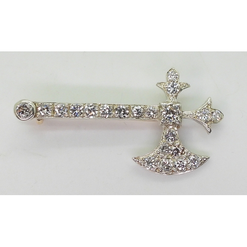 2763 - A DIAMOND AXE BROOCHset with estimated approx 0.80cts of brilliant cut diamonds, to the yellow and w... 