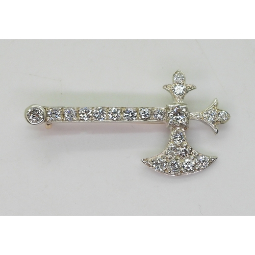 2763 - A DIAMOND AXE BROOCHset with estimated approx 0.80cts of brilliant cut diamonds, to the yellow and w... 