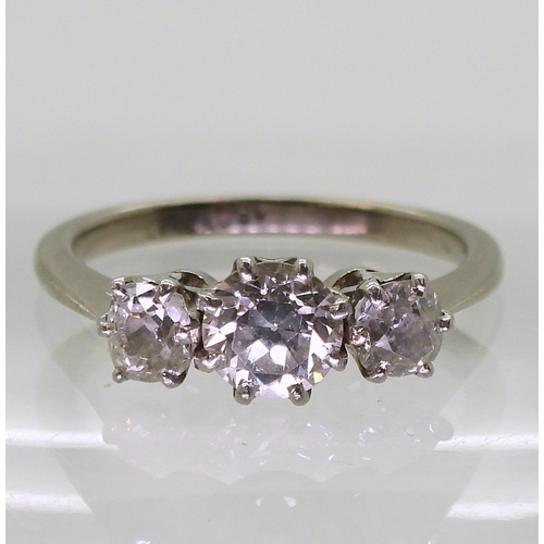 2755 - A CLASSIC THREE STONE RINGthe 18ct white gold and platinum mount is set with old cut diamonds with a... 