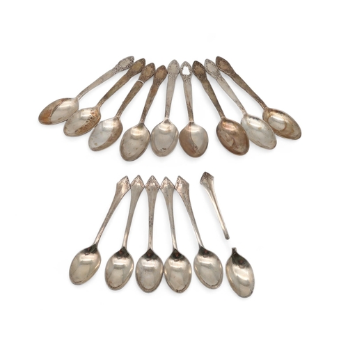 A set of eight marked 'Silver' tea spoons, with scrolling foliate ...