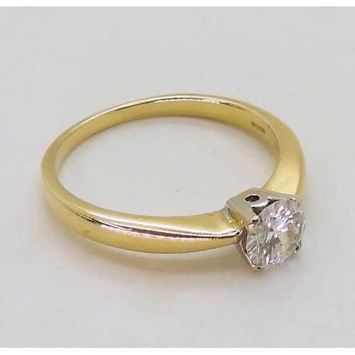 712 - An 18ct gold diamond solitaire ring of estimated approx 0.60cts, size Q1/2, weight 3.4gms