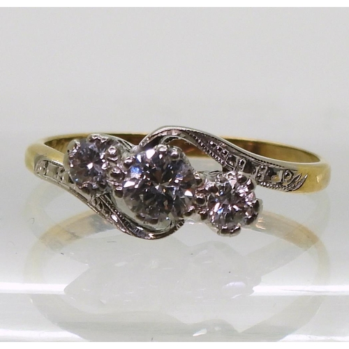 782 - An 18ct gold and platinum three stone diamond ring set with estimated approx 0.30cts of brilliant cu... 