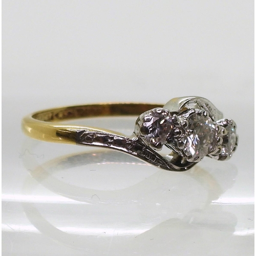 782 - An 18ct gold and platinum three stone diamond ring set with estimated approx 0.30cts of brilliant cu... 