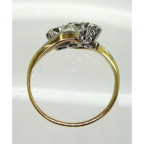 782 - An 18ct gold and platinum three stone diamond ring set with estimated approx 0.30cts of brilliant cu... 