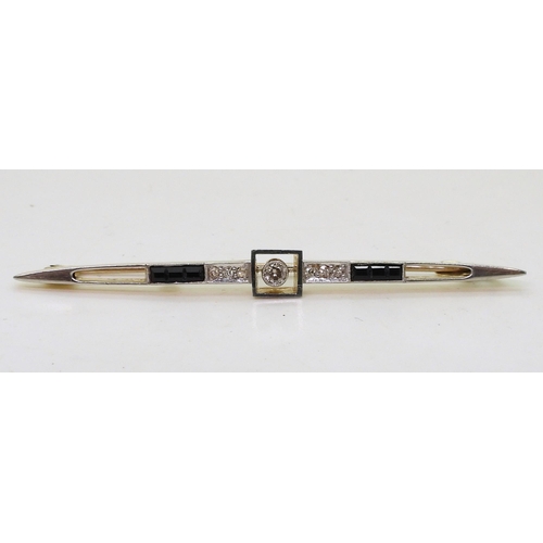 789 - A 15ct gold diamond and black gem bar brooch, set with estimated approx 0.12cts of old cut diamonds,... 