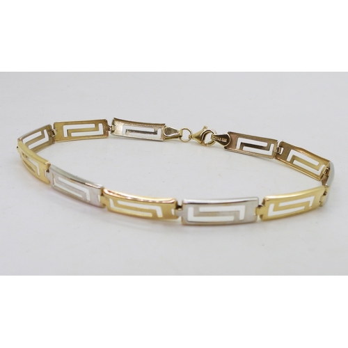 796 - A 14k gold bi colour key pattern bracelet, length 20cm, weight 3.7gms