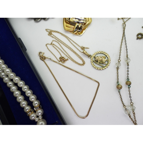 829 - A large jet brooch, a 9ct chain, with gold plated St, Christopher and a 9ct bracelet (weight 2.1gms)... 