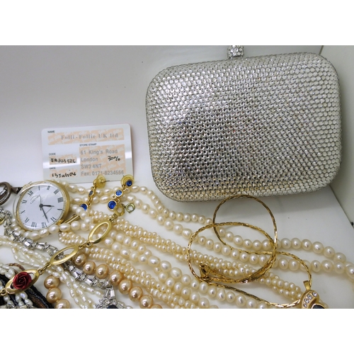 866 - A diamante handbag by Karen Kelly, garnet beads, strings of cultured pearls and bracelets, further n... 