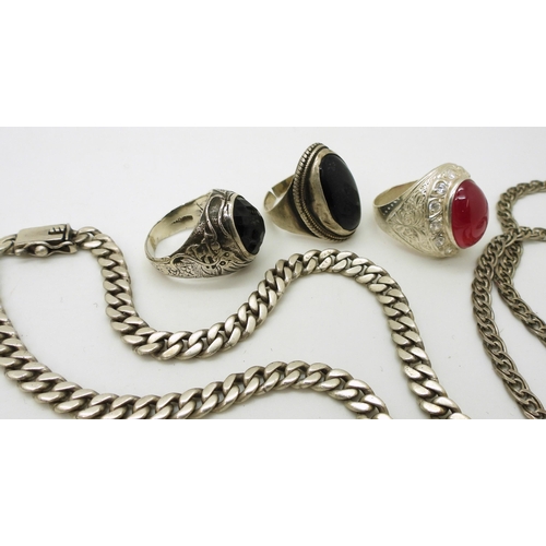 869 - A collection of silver and white metal jewellery to include curb chain necklaces, an Italian double ... 