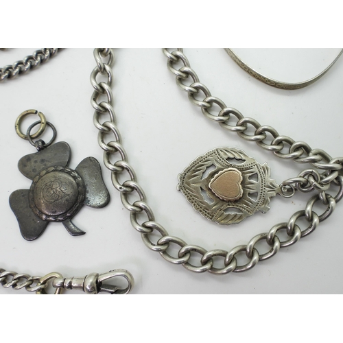 890 - Three silver fob chains, with two silver medallions one in the shape of a shamrock, a further 1893 Q... 