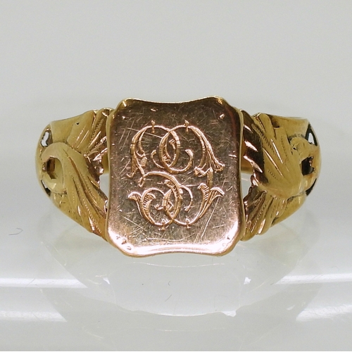 2761 - A FRENCH 18CT GOLD SIGNET RINGleaf design shoulders, monogramed CG, stamped with the french eagles h... 