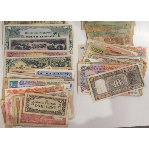 385 - A lot comprising bank notes with Japanese, Japanese occupation pesos, rupees and dollars, Indian rup... 