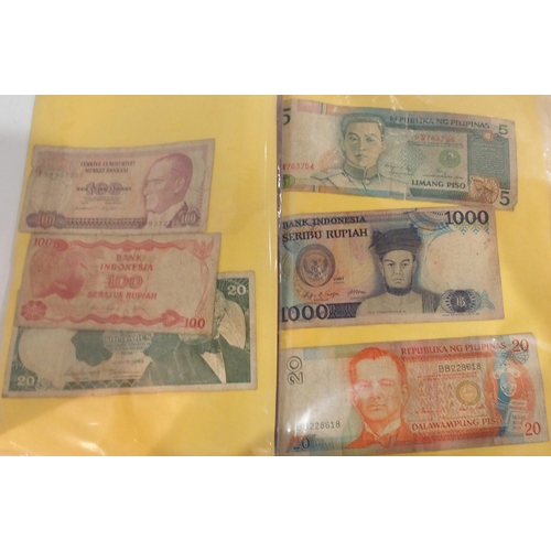 390 - A lot comprising South East Asian bank notes with examples from Cambodia, Laos, Vietnam and Burma (M... 