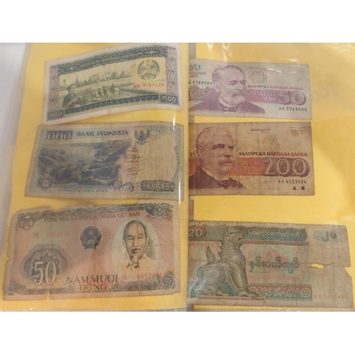 390 - A lot comprising South East Asian bank notes with examples from Cambodia, Laos, Vietnam and Burma (M... 