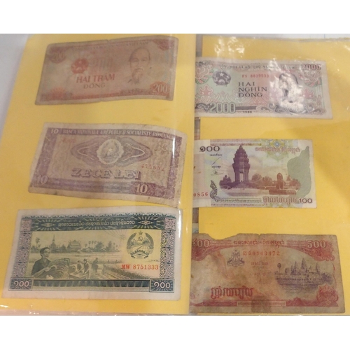 390 - A lot comprising South East Asian bank notes with examples from Cambodia, Laos, Vietnam and Burma (M... 