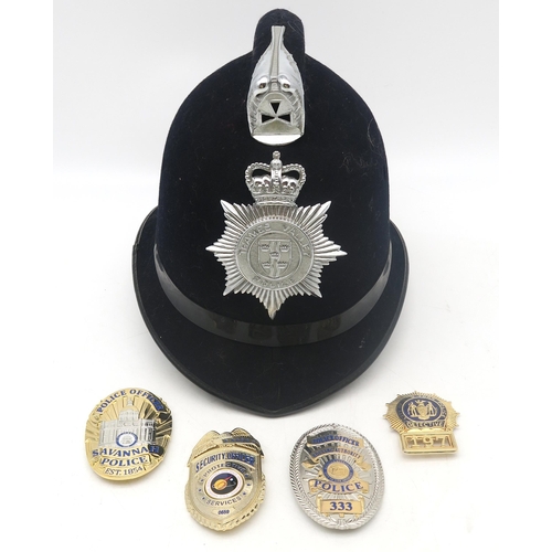 457 - A 1970s/80s Thames Valley Police helmet, together with four gilt metal 