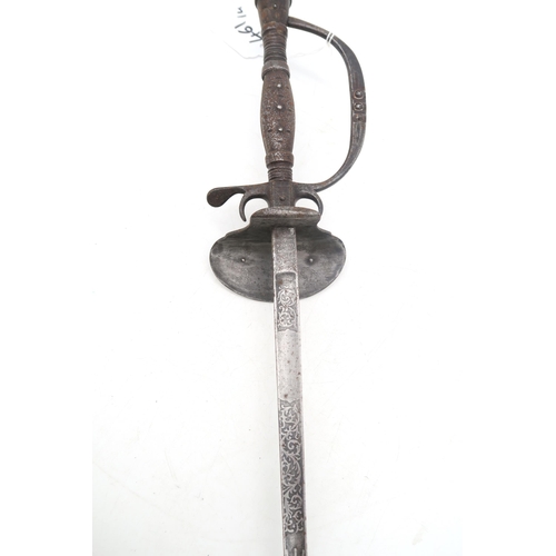 461 - A French briquet or short sword, the blade measuring approx. 58.5cm in length and stamped 