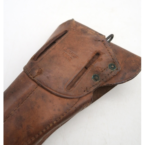 476 - A leather submachine gun magazine case, with contents; together with a WW2 US Colt 1911 holster, sta... 